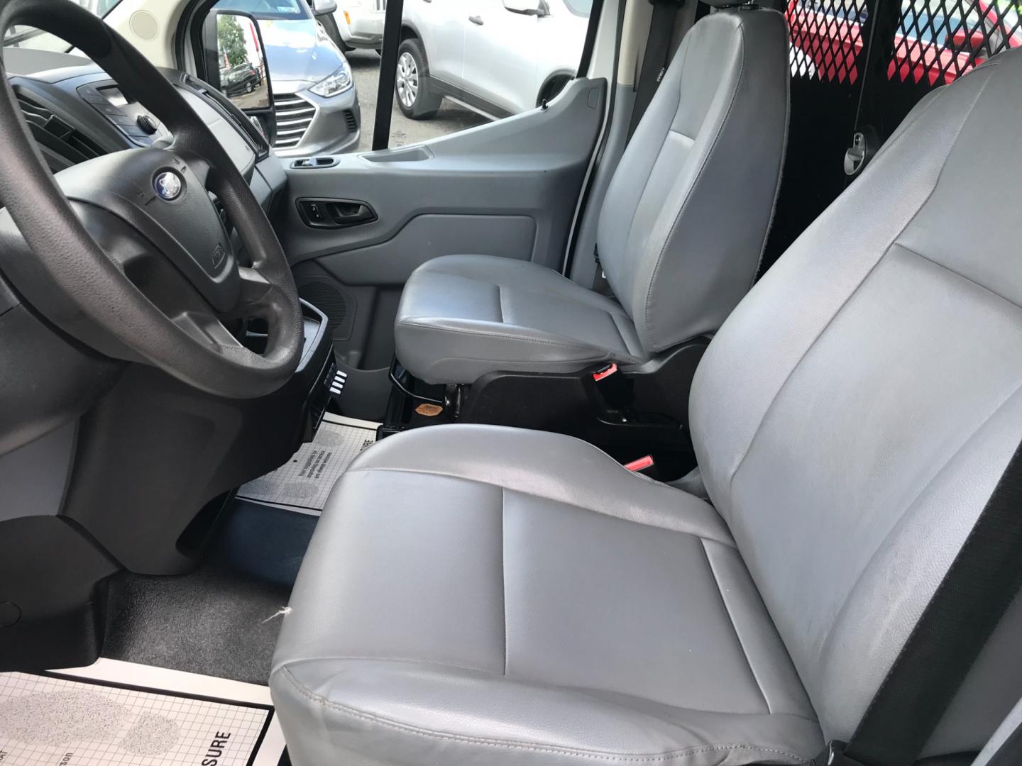 2018 White /Gray Ford Transit 150 Low Roof (1FTYE1YM7JK) with an 3.7 V6 engine, Automatic transmission, located at 577 Chester Pike, Prospect Park, PA, 19076, (610) 237-1015, 39.886154, -75.302338 - 2018 Ford Transit 150 Low Roof: Double drop down ladder racks, multiple pieces of shelving, heavy duty partition, new PA inspection, FLEET MAINTAINED, runs LIKE NEW! This vehicle comes inspected and has been given a bumper to bumper safety check. It is very clean, reliable, and well maintained. W - Photo#11